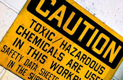 Sign showing caution toxic hazardous chemicals.