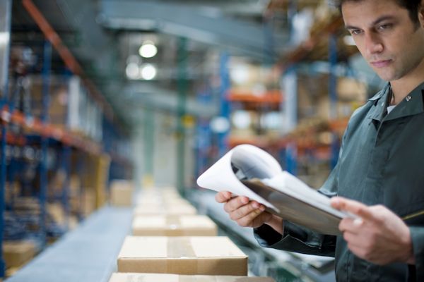 Image of an employee looking at a checklist