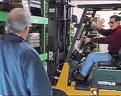 employee conducing forklift refresher training