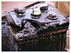 a battery badly damaged by sulfuric acid