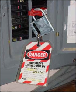Image of a locked master switch on a panel
