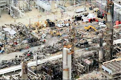 Image of oil refinery destruction.