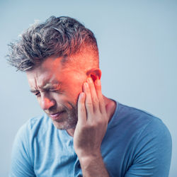 worker with ear pain