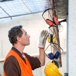 worker selecting hearing protection