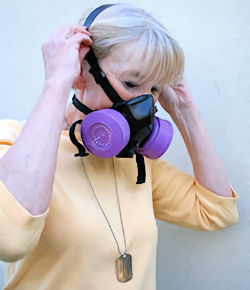 Employee testing respirator