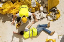 Image of worker responding to an injured coworker.