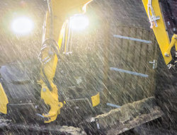 backhoe work in wet and rainy conditions