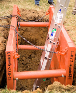 Supported trench box with ladder