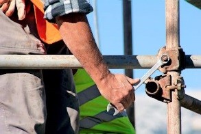 Tightening bolt on scaffolding