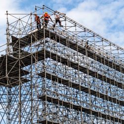 Large and elevated scaffold showing bearers and runners.