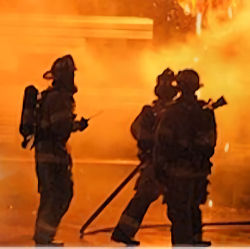 Fire fighters figting a fire
