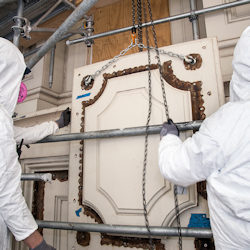 workers in full PPE also with respirators 
