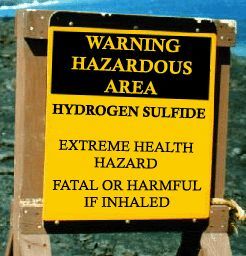 Sign warning those who enter that it is a Hydrogen Sulfide Hazardous area