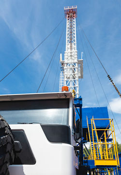 Servicing rig on a completed well site