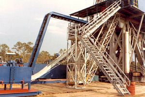 Drilling rig stairway with handrails and guardrails