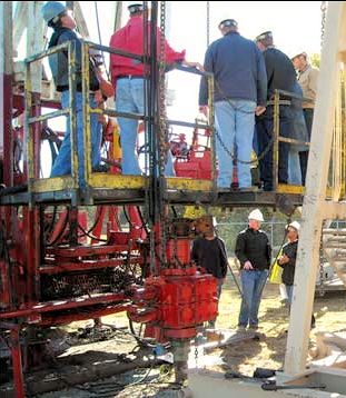 Employees standing on a work platform