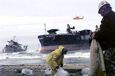 Worker watching boat sink and preparing for emergency