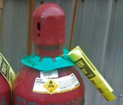 tagged compressed gas cylinder